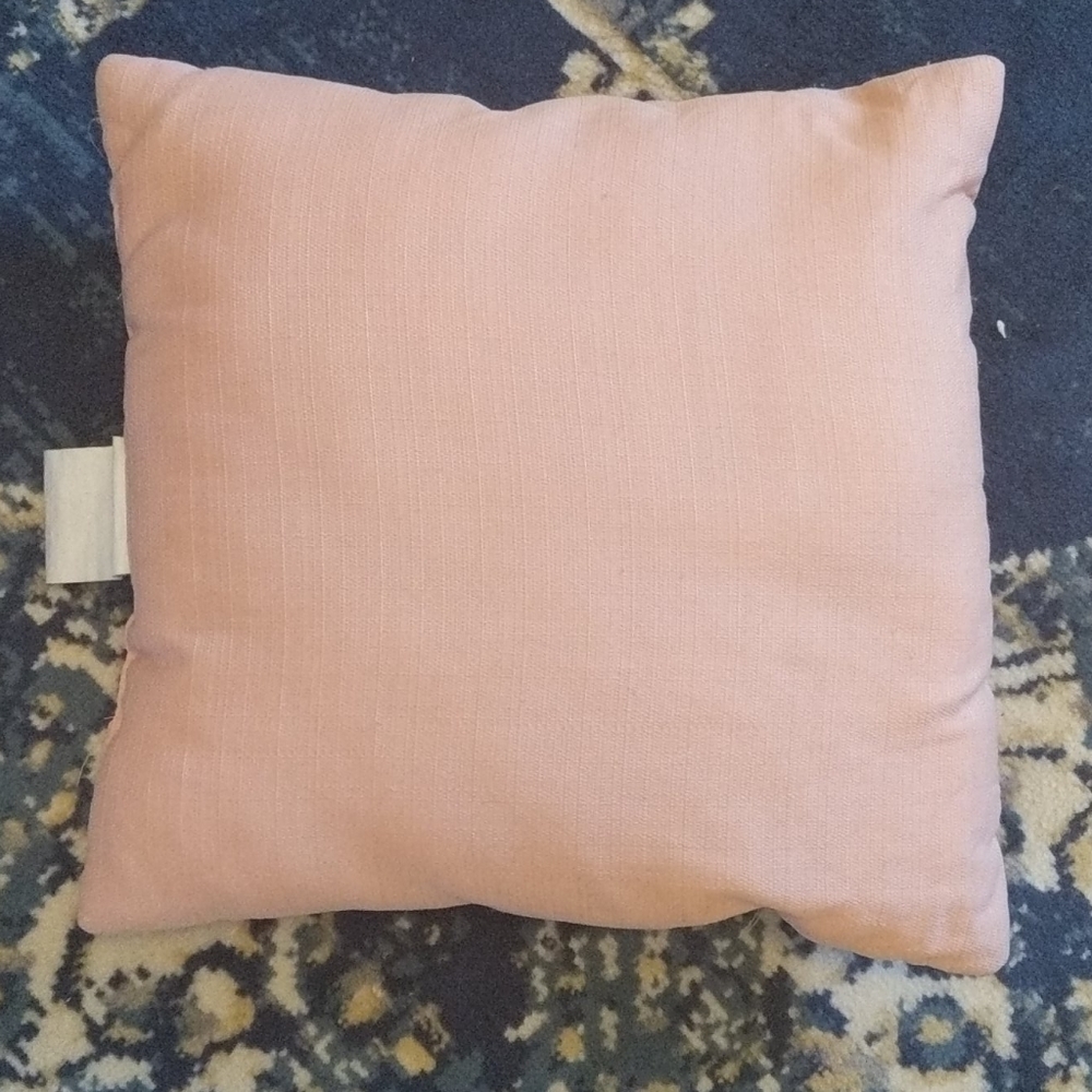 Pink accent pillow